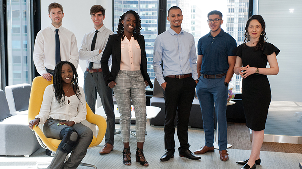 7 Loyola students named CME Group Foundation Scholars, at CME building in Chicago