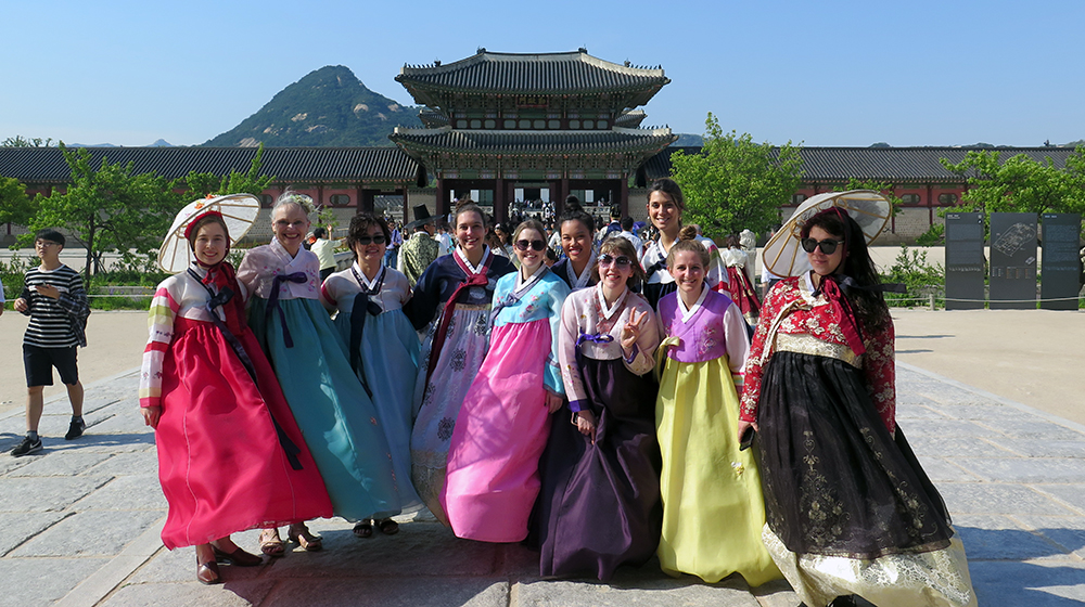 The Global and Strategic Communication graduate program at Kyung-bok Palace, donning traditional Hanbok dress.