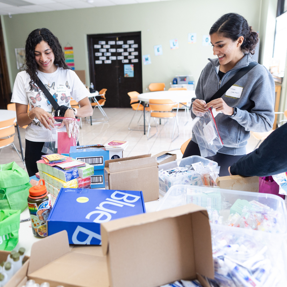 Students packing kits for Loyola Street Medicine