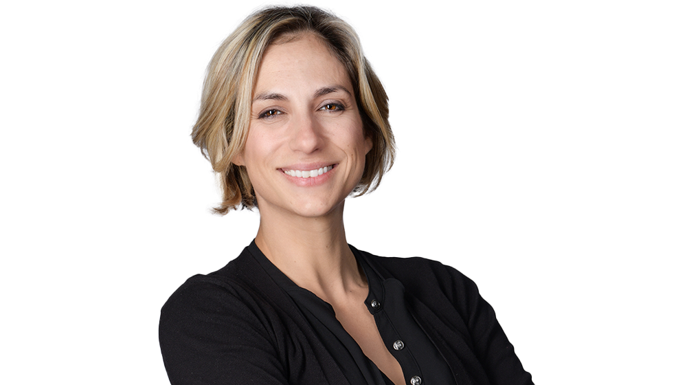 Woman smiling in a black shirt on white background 