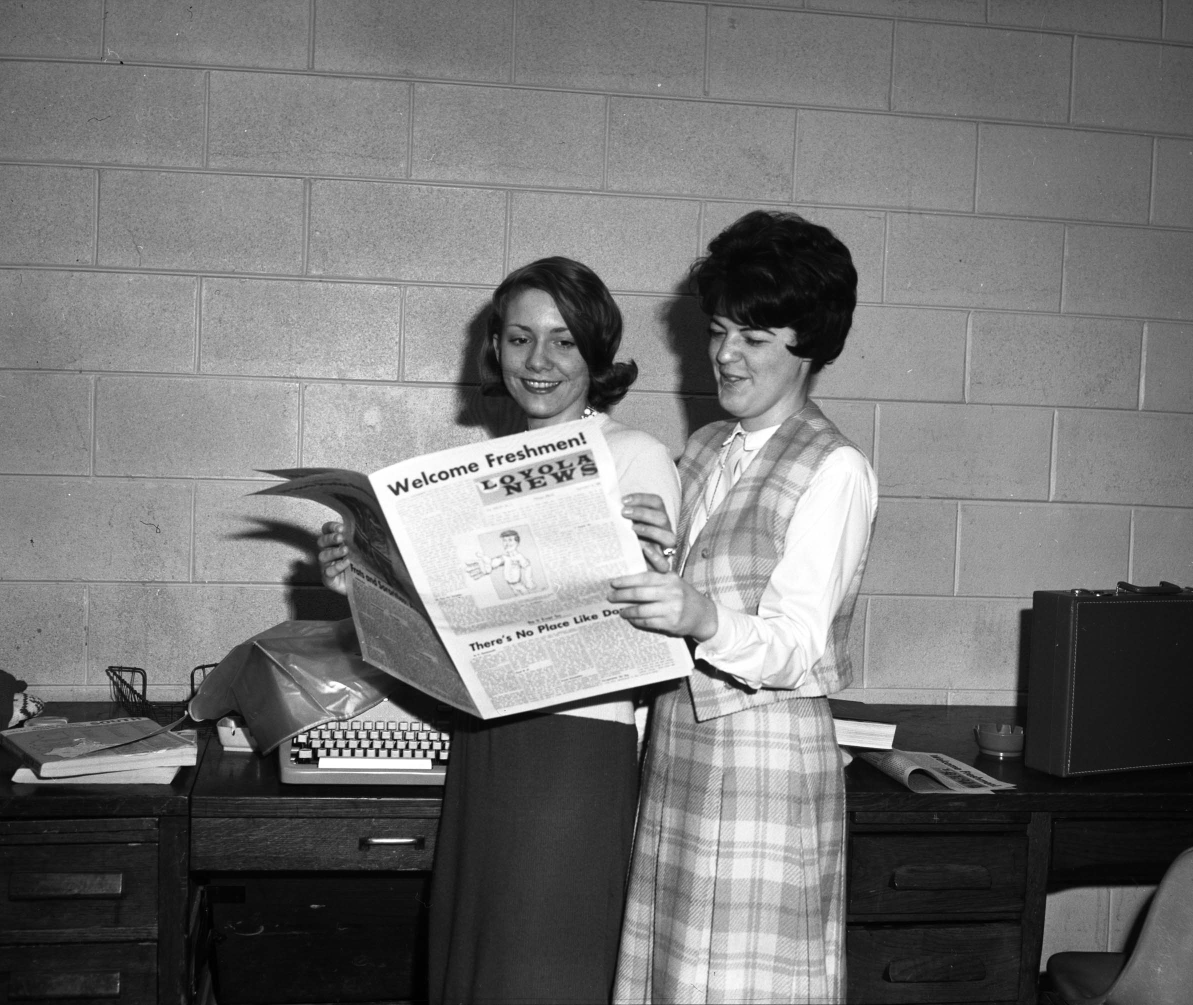 Two Loyola News staffers with first issue of the year