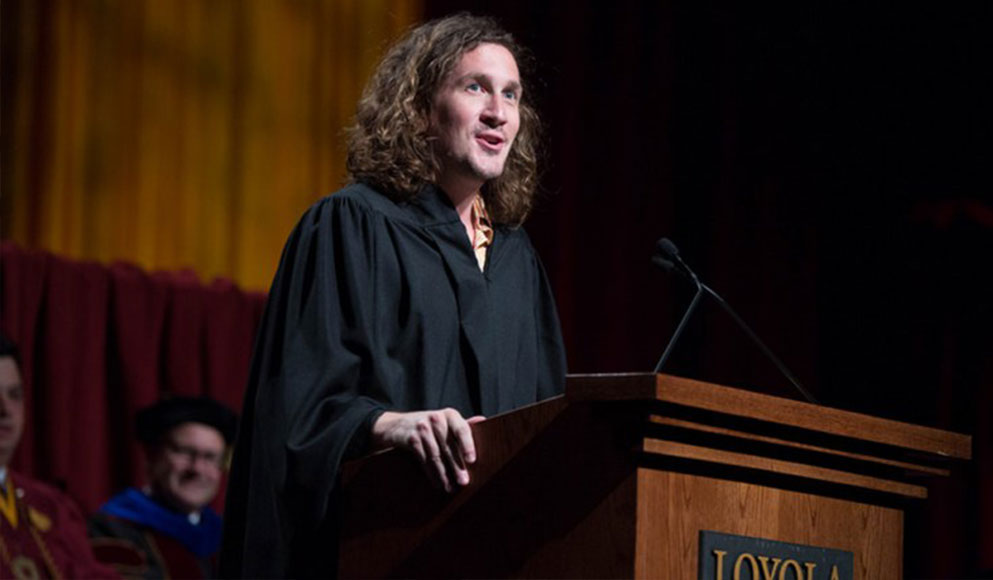 Ian Brennan Speaking at Podium 