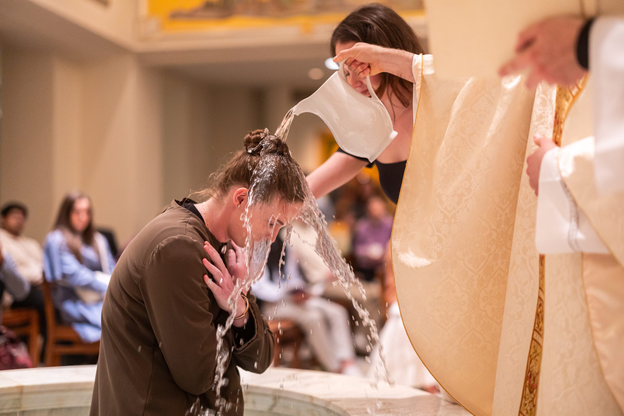 Baptism MDS (Photo: Lukas Keapproth, Loyola Lens) Baptism MDS (Photo: Lukas Keapproth, Loyola Lens)