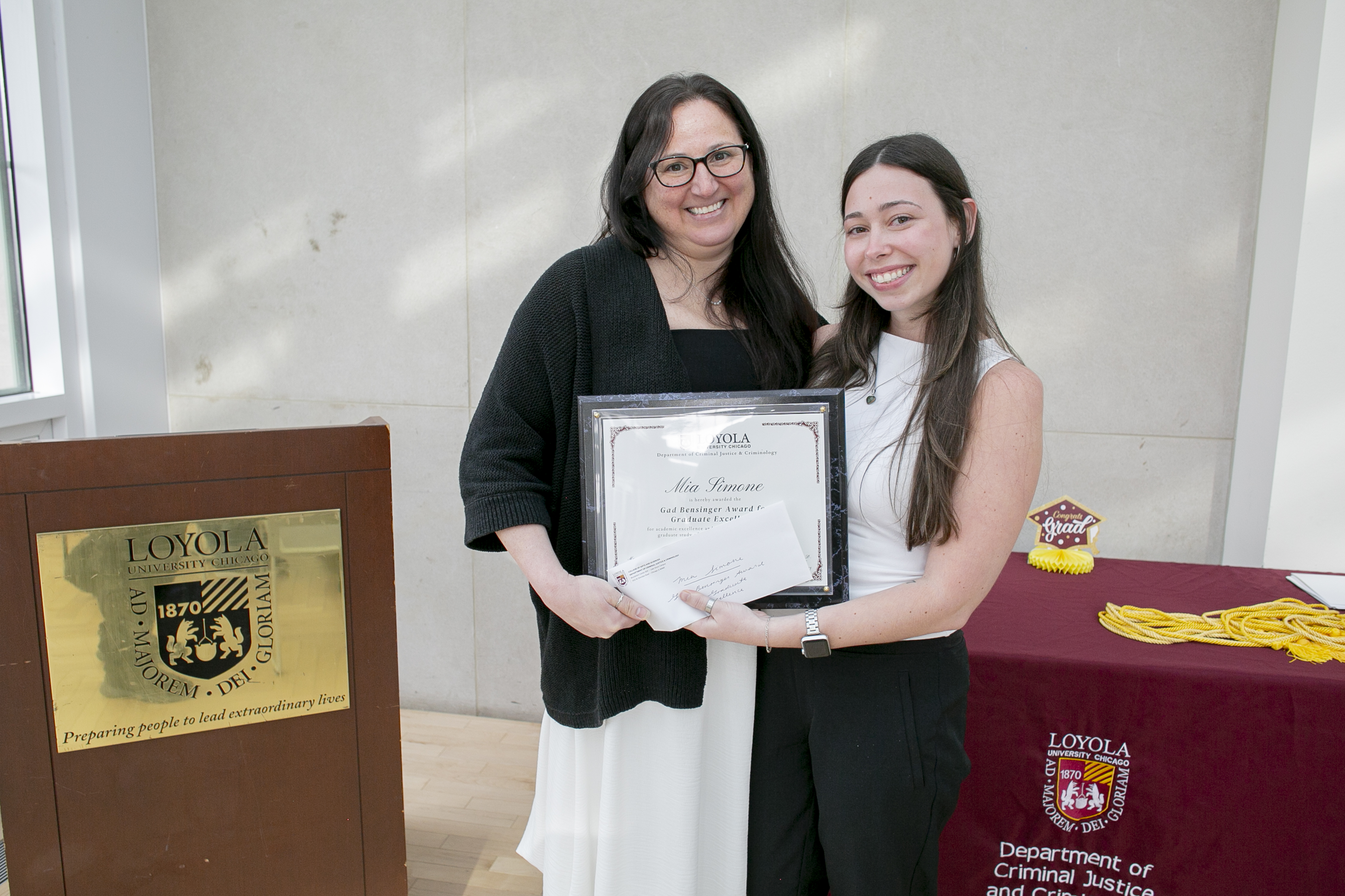 Mia Simone, winner of Gad Bensinger Award for Graduate Excellence, posing with Dr. Rezey