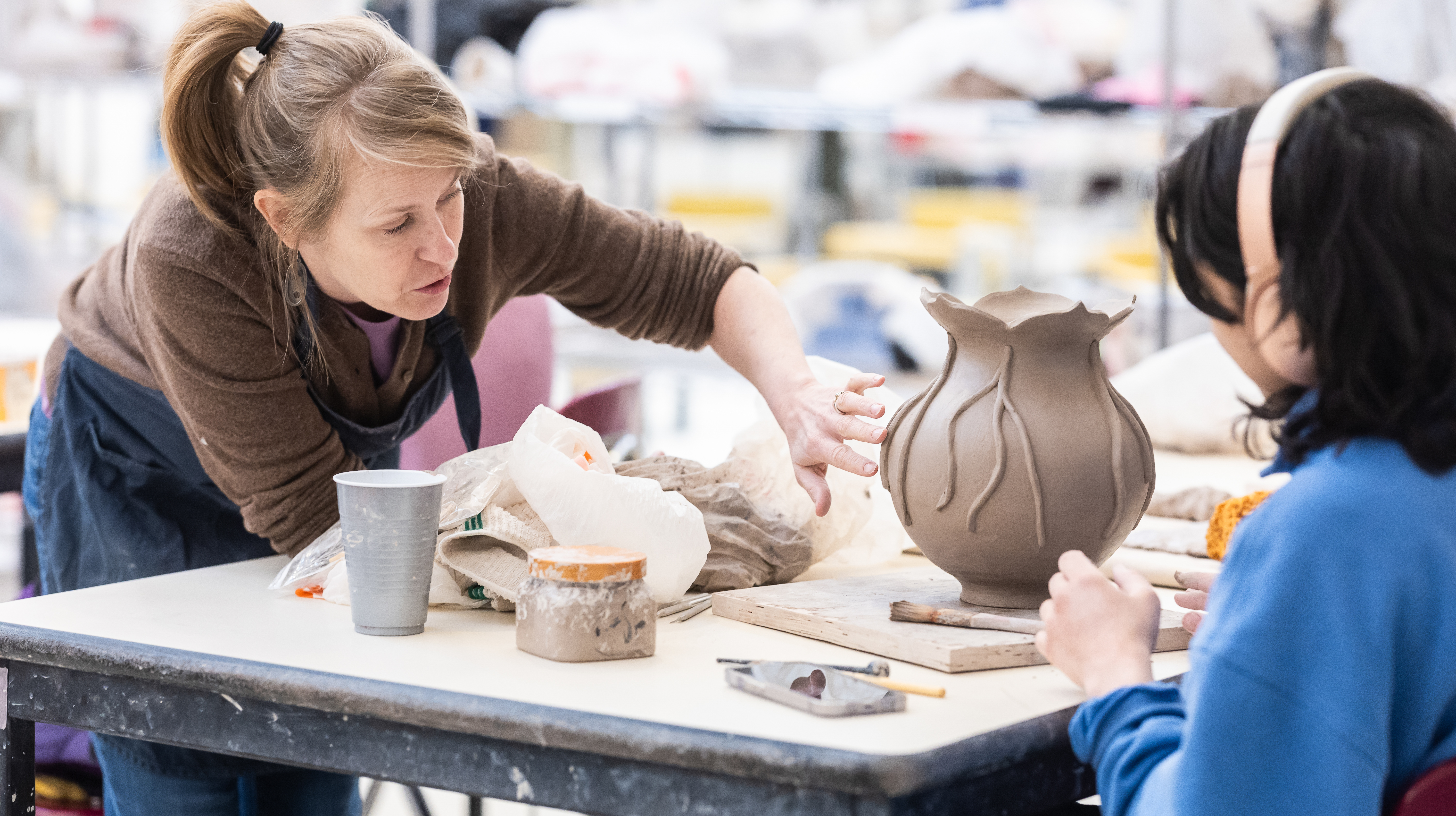 Loyola Fine Arts Faculty providing instruction in the studio Loyola Fine Arts Faculty providing instruction in the studio