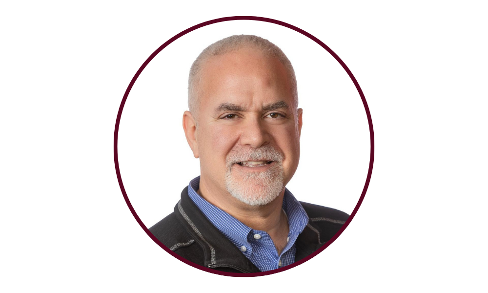 Michael Lubelfeld close up with dress shirt and quarter zip.