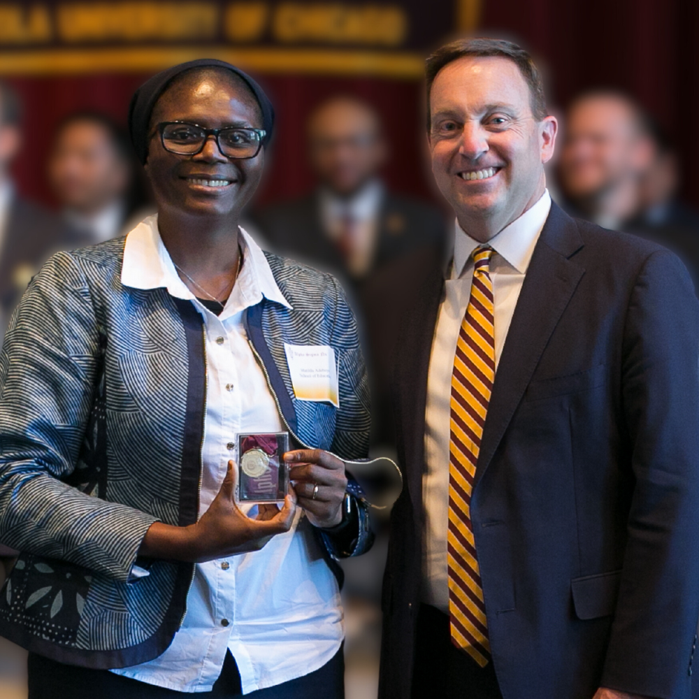 Loyola Chicago student Matilda Adeboye is inducted into Alpha Sigma Nu.