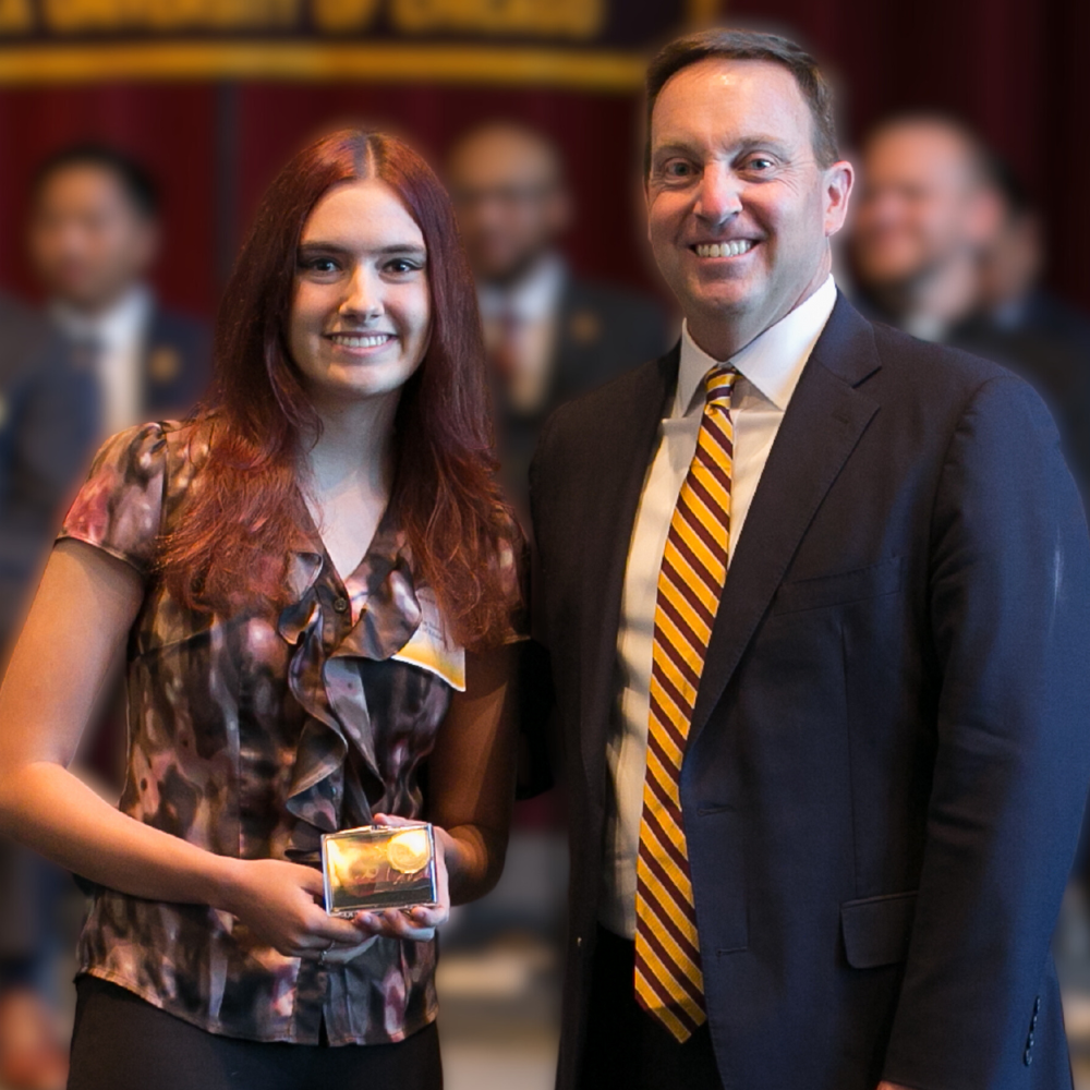 Loyola Chicago student Skylar Baker is inducted into Alpha Sigma Nu.