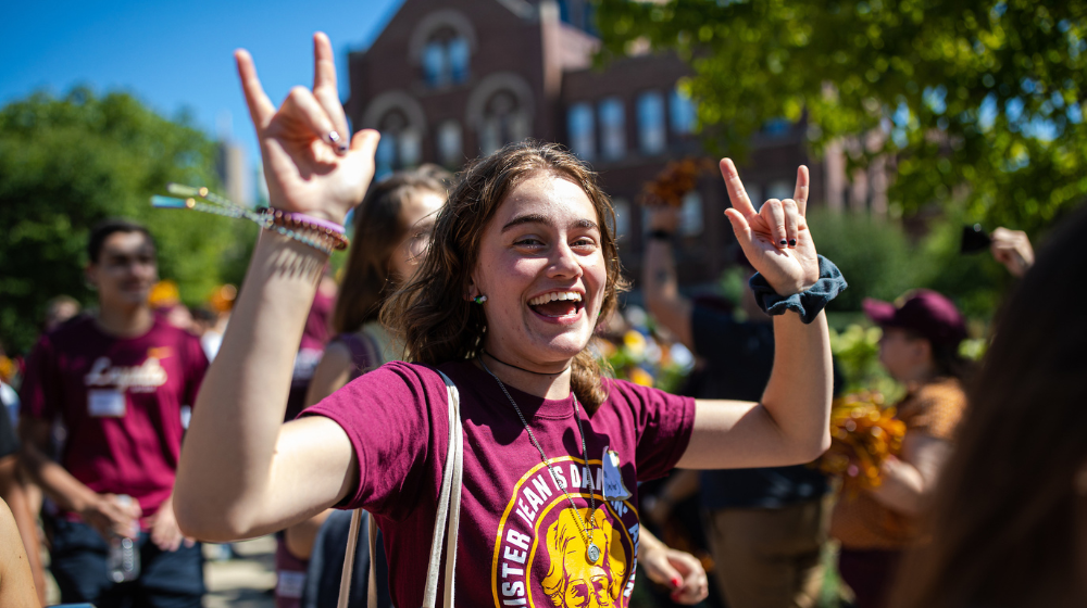 freshman celebrates during welcome weekend on Loyola campus