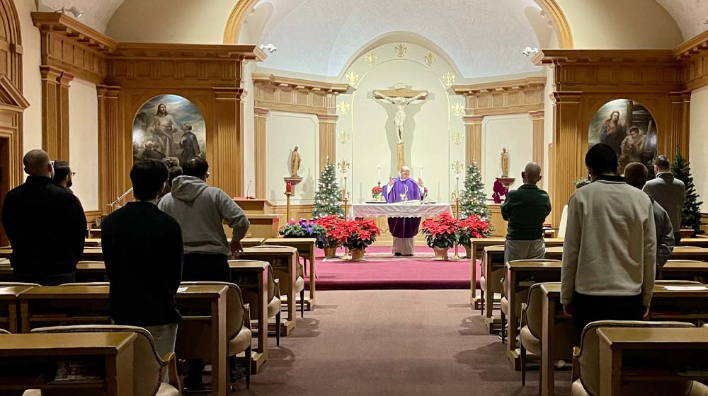 First Studies men participate in Mass during annual vow renewal triduum. First Studies men participate in Mass during annual vow renewal triduum.