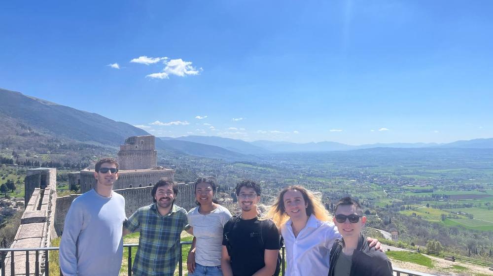 Students picture with Assisi landscape Students picture with Assisi landscape