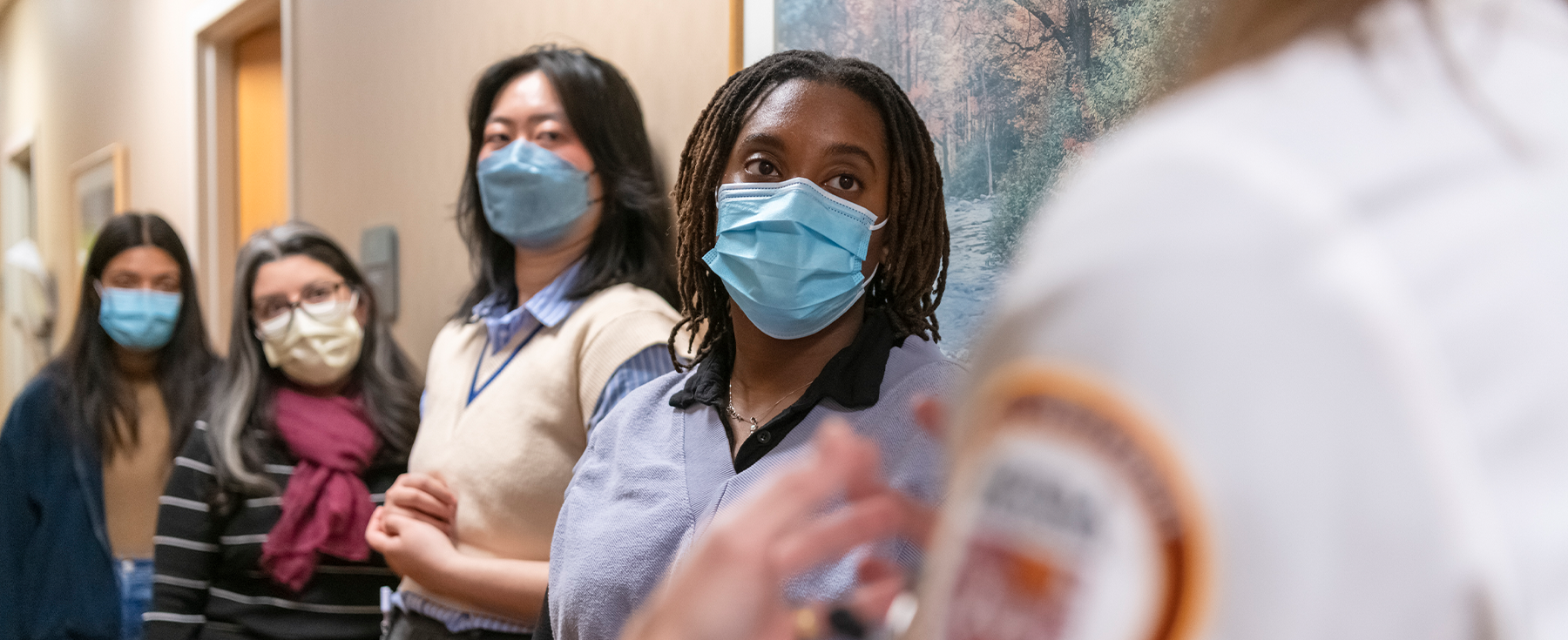 HJP students listening to a doctor