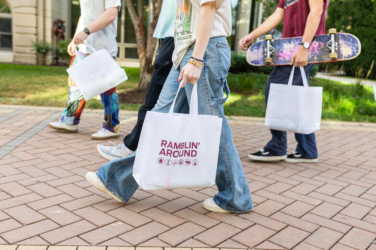 students with shopping bags