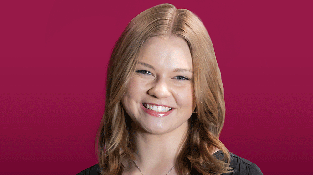 Headshot of Arianna Moen against maroon background Headshot of Arianna Moen against maroon background