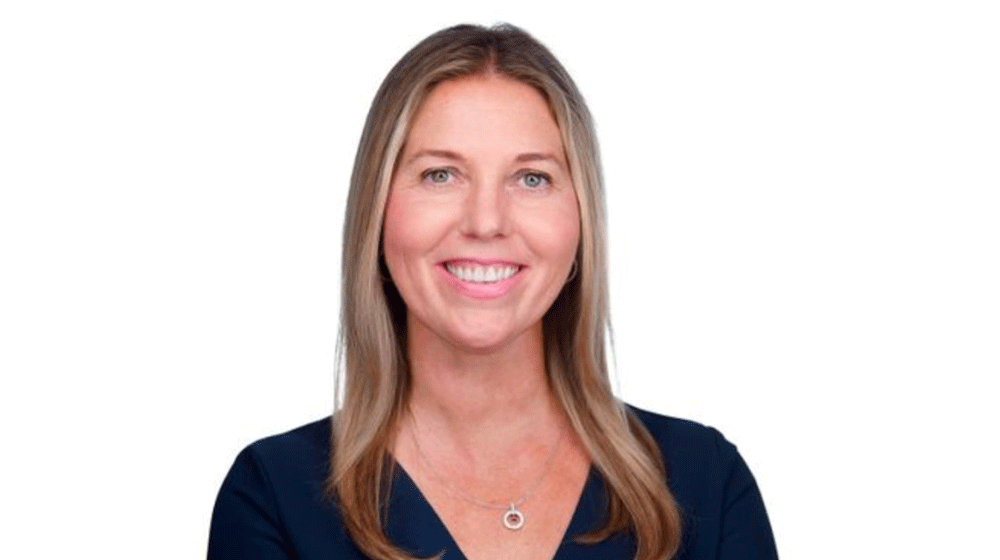Melissa Murphey, wearing a dark shirt and necklace, is showing from the shoulders up, smiling Melissa Murphey, wearing a dark shirt and necklace, is showing from the shoulders up, smiling