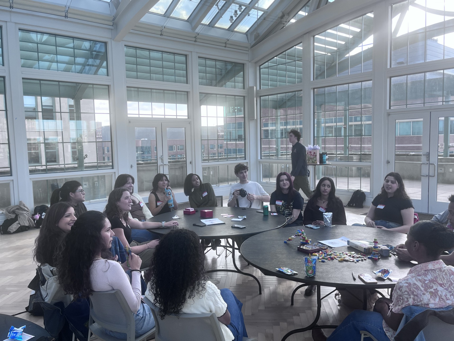 Students engaged in a Community Circle in Loyola's Palm Court.