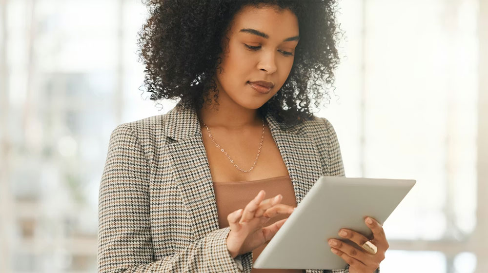 Woman working on a digital pad