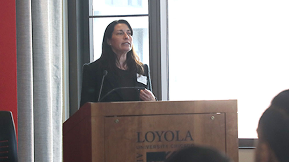 Darcy Addison speaking at Philanthropy event 2026
