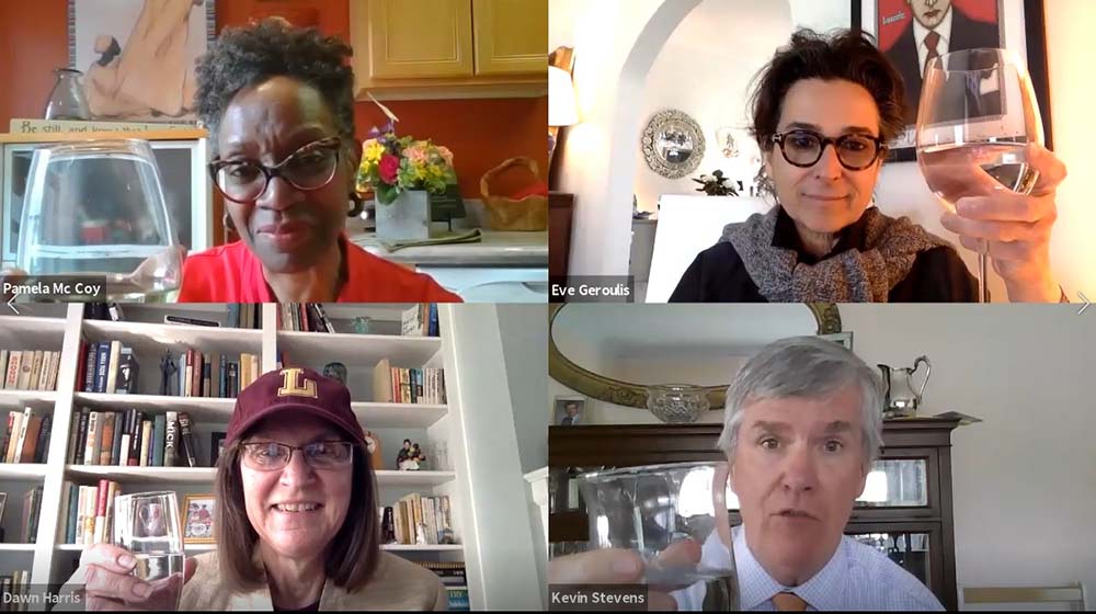 Four faculty and staff members raising their glasses in a toast. Four faculty and staff members raising their glasses in a toast.