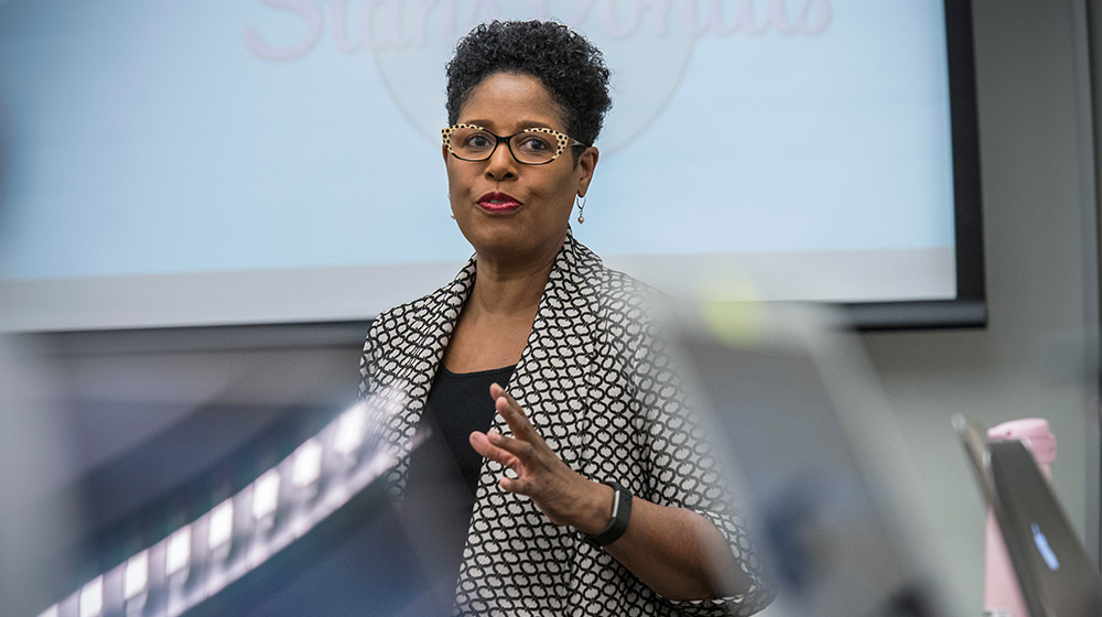 Geraldine Rosa Henderson, PhD, speaking to a Quinlan class