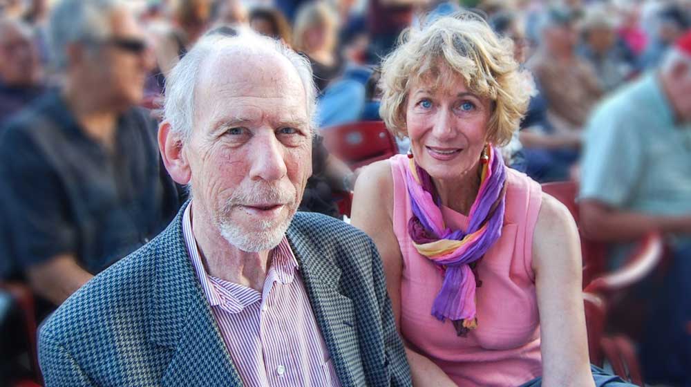 Image of George Kaufman and Mimi Winters at an outdoor concert Image of George Kaufman and Mimi Winters at an outdoor concert