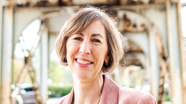 Carol Fitzgibbons headshot under a bridge