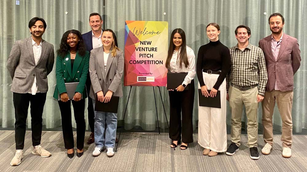 The winners of the venture pitch competition pose for a photo