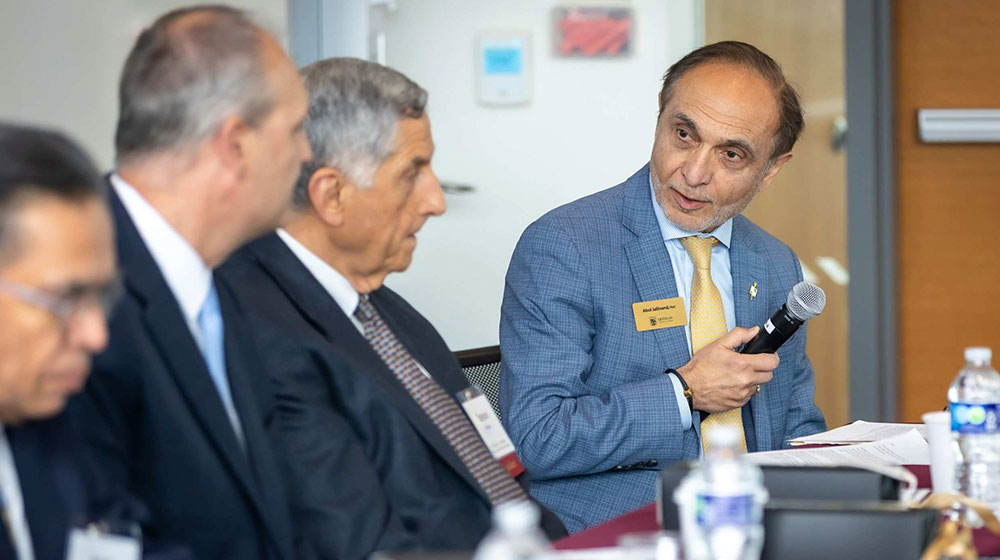 Abol Jalilvand talking to other panelists