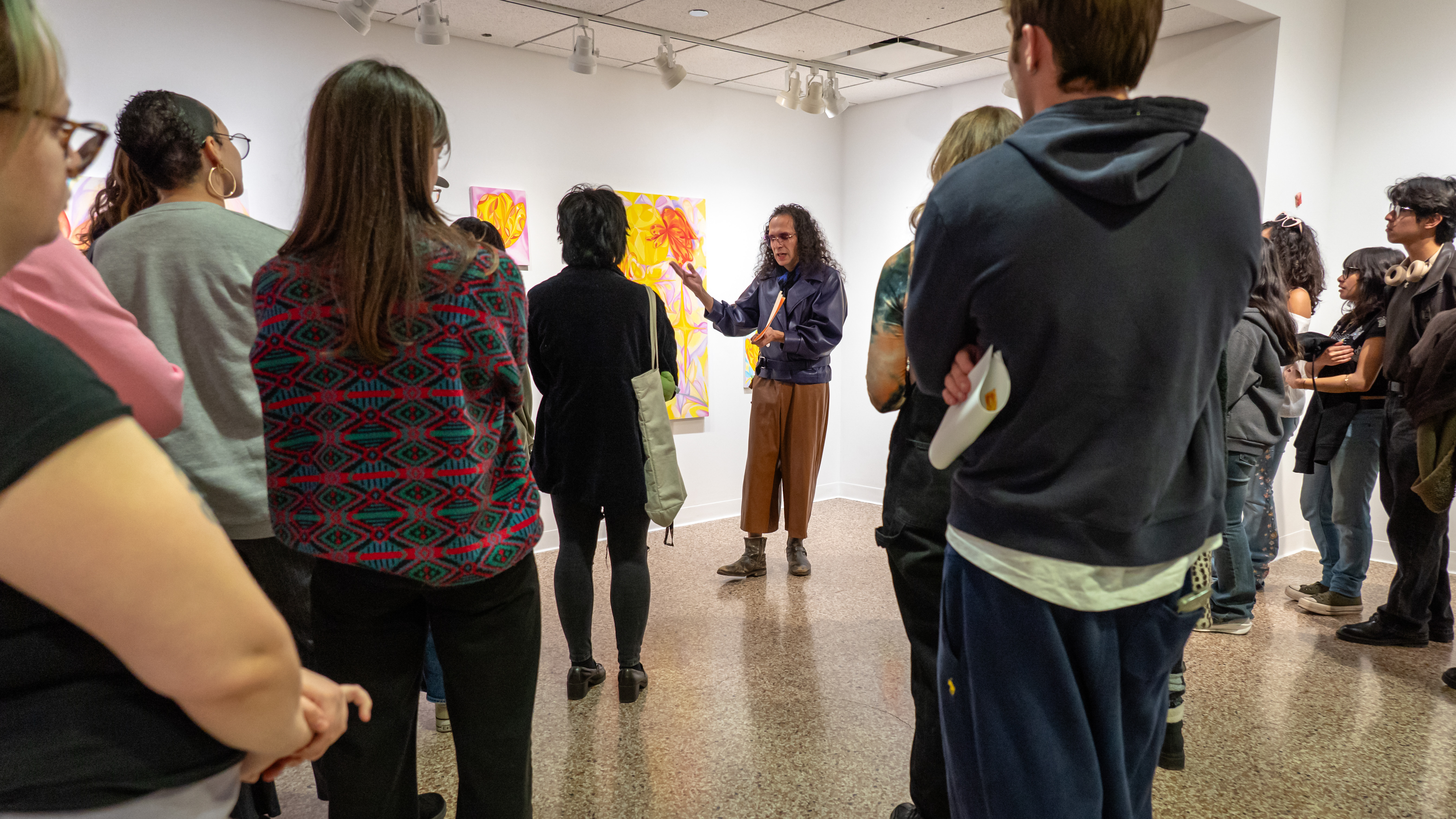 Loyola Fine Arts Students attending an artist talk in Ralph Arnold Gallery
