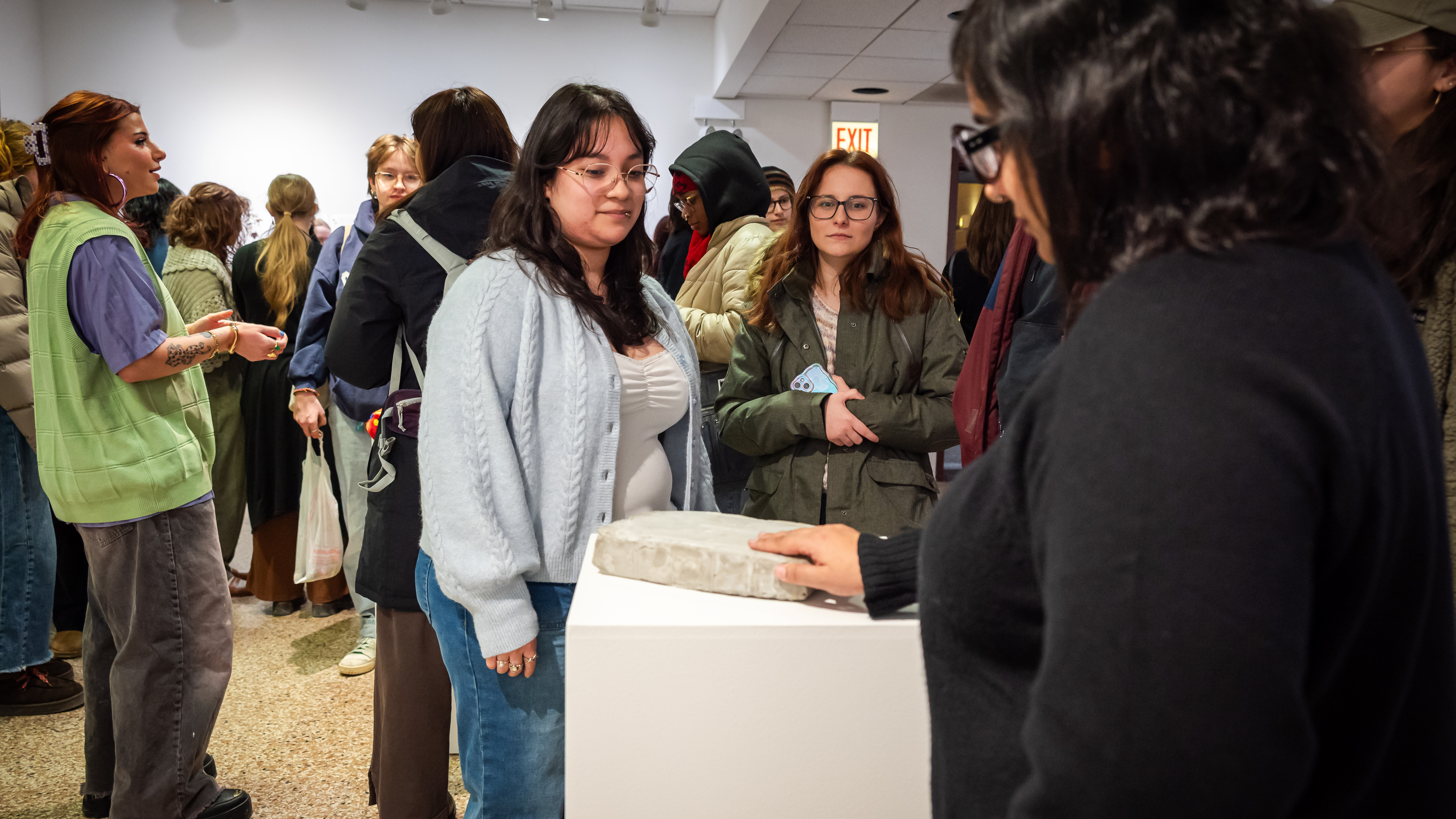 Loyola Fine Arts Faculty and Students attending an exhibition opening