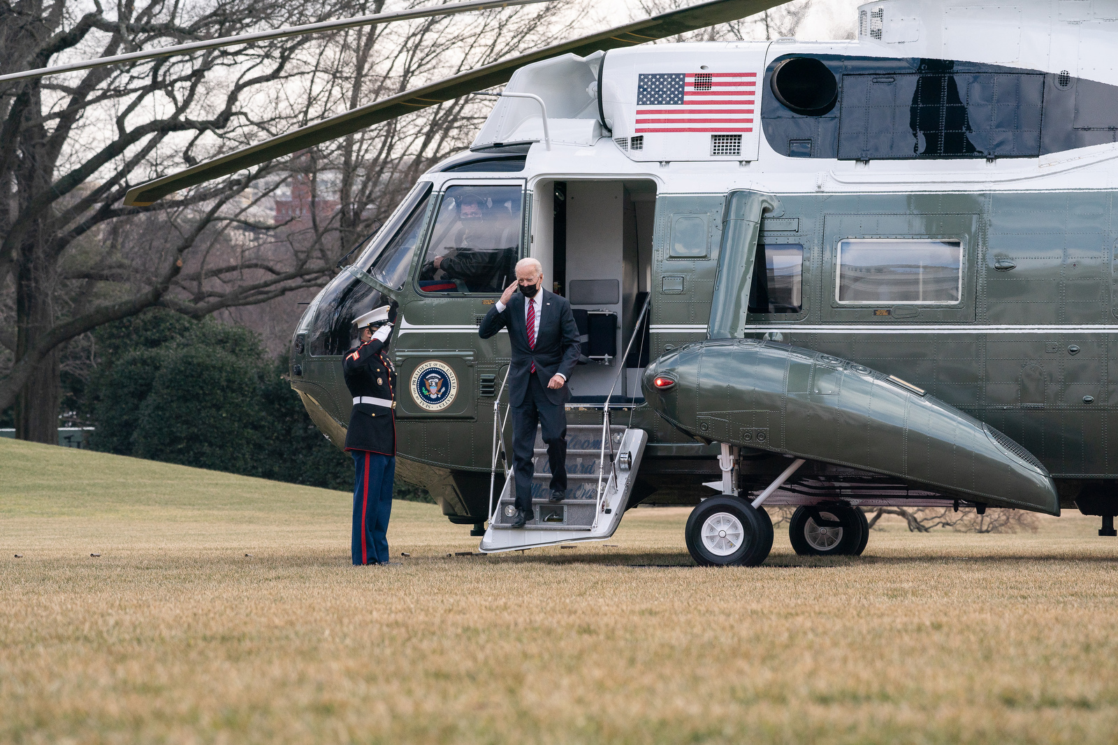 President Joe Biden exits a helicopter