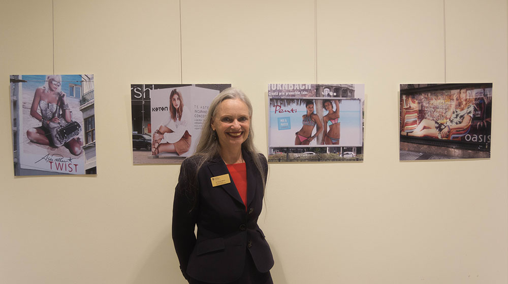 Pamela Morris, the program Director of Advertising and Public Relations, showcases her work in an art exhibit at the School of Communication. Her project looks at how men and women are depicted in languages, visuals, and product types in counties across the globe. She has presented for papers at seven different conferences about outdoor advertising around the world and has been published in three academic journals since completing her project and research.