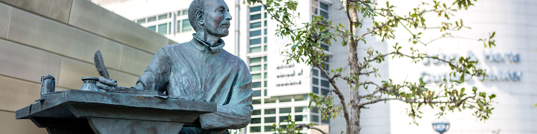 A statue of St. Ignatius of Loyola located in the Klarchek Information Commons on Loyola’s Lake Shore campus