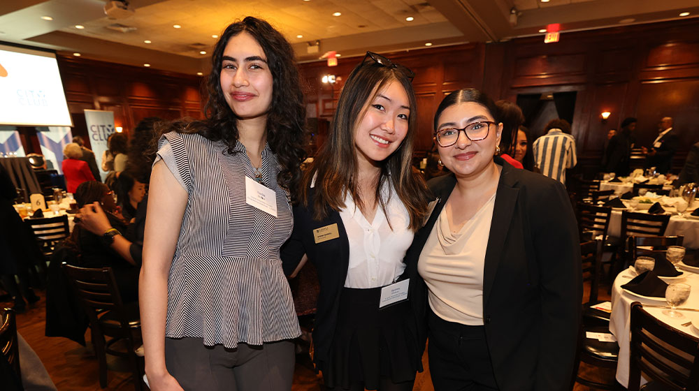 Students pose at the City Club. Students pose at the City Club.