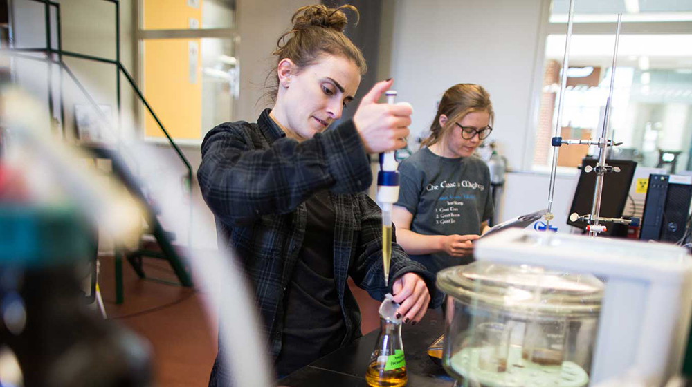 two students work in biodiesel lab