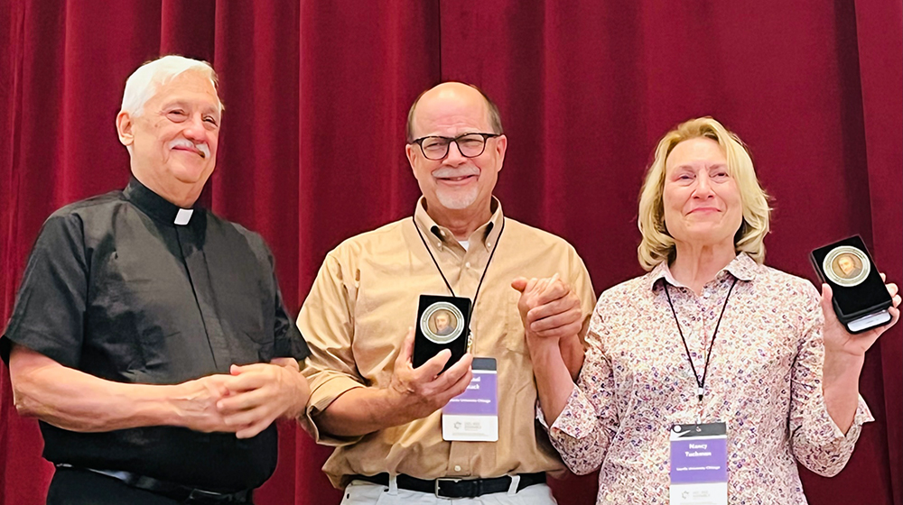 Father Arturo Sosa, S.J., Superior General of the Society of Jesus (left) with Michael Schuck (center) and Nancy Tuchman (right)