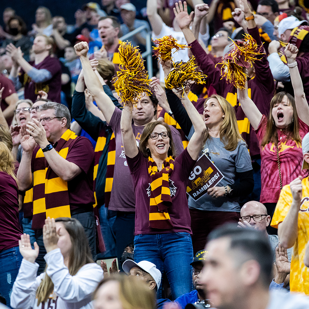 Crowd cheers at a Loyola basketball game