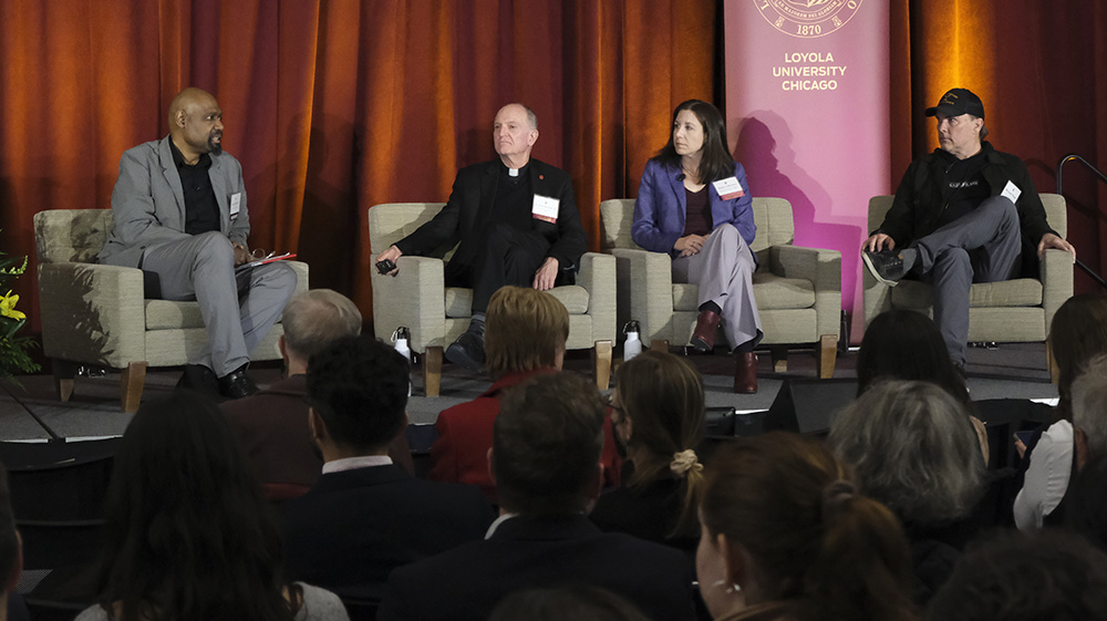 panelists on stage at the climate change conference 