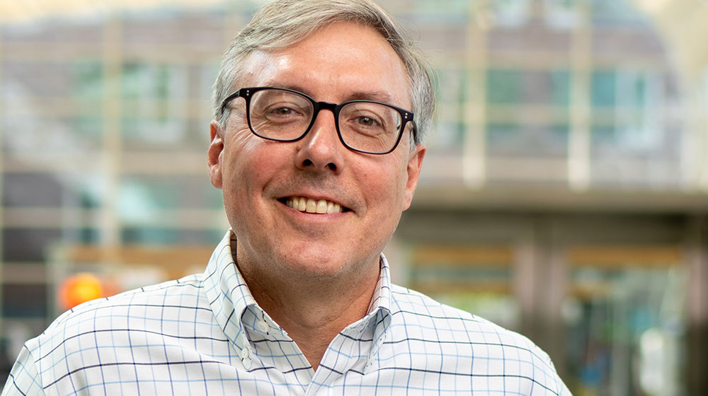 Aaron Durnbaugh smiling in Loyola's School of Environmental Sustainability