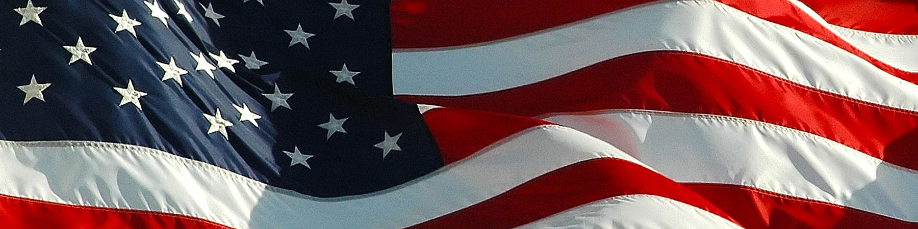 A close up of an American flag waving