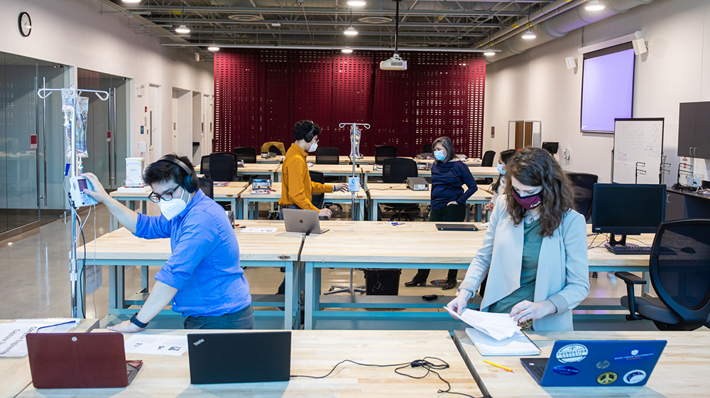 Engineering students at Loyola University Chicago engage in "active learning," making it critical for them to be in the lab to complete their coursework. (Photo: Lukas Keapproth)