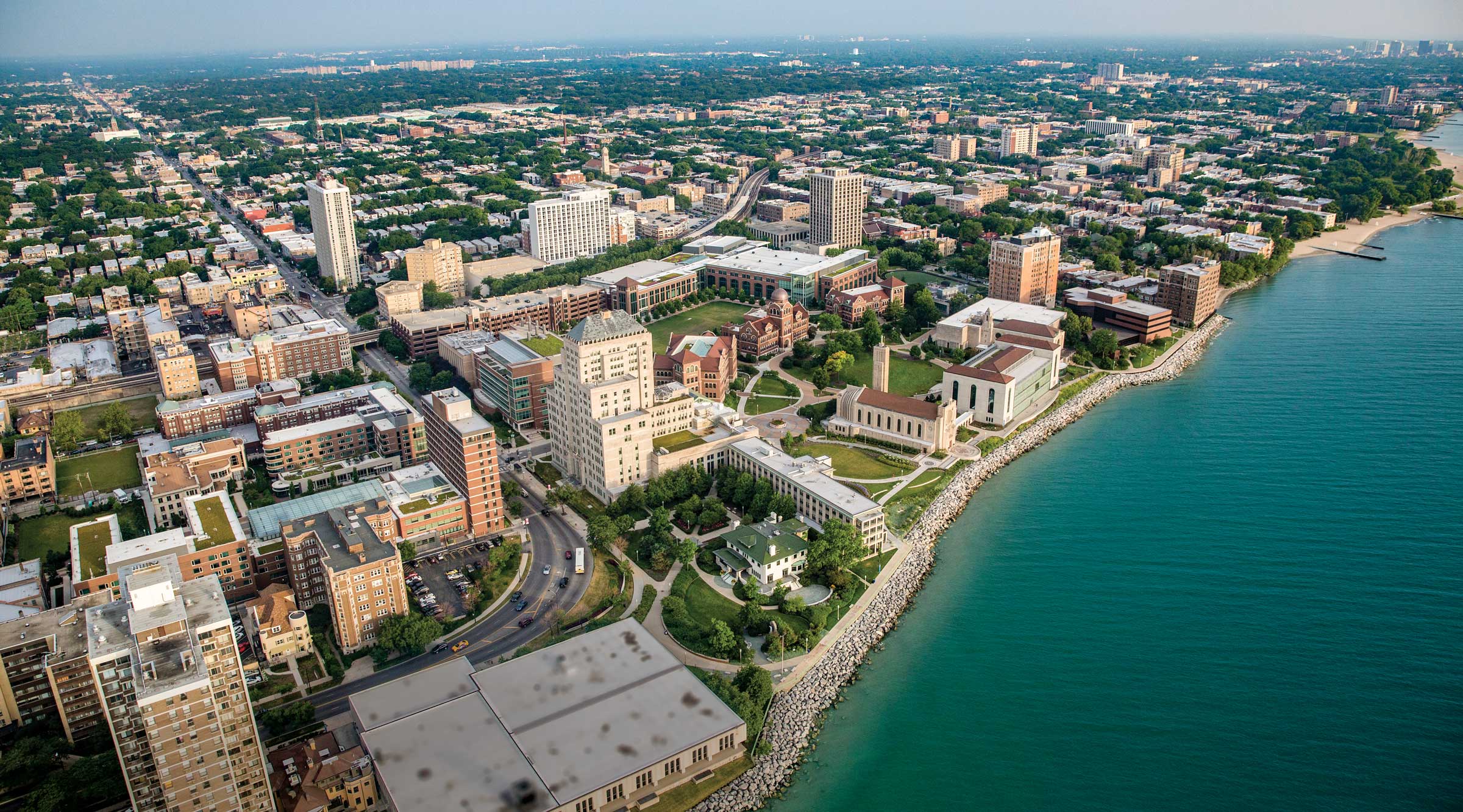 An aerial perspective of Loyola University Chicago's Lake Shore Campus from a southeast vantage point